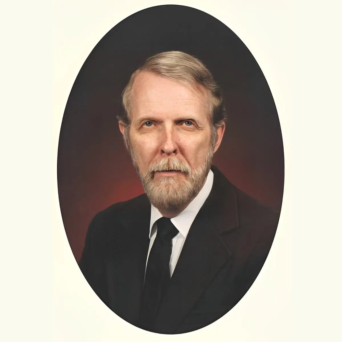 Portrait of a man in formal attire.