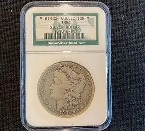 1884 Silver Dollar in protective case.