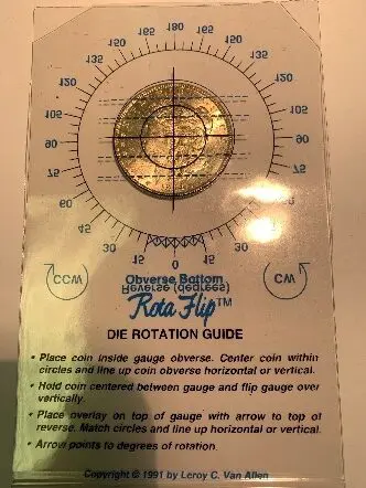 Coin rotation guide with measurement markings.