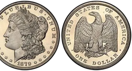 Close-up of an old United States silver dollar coin with detailed eagle and floral designs.