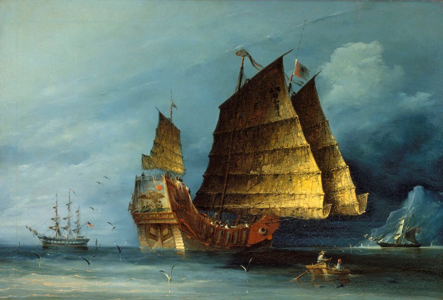 Sailing ships on a stormy ocean.