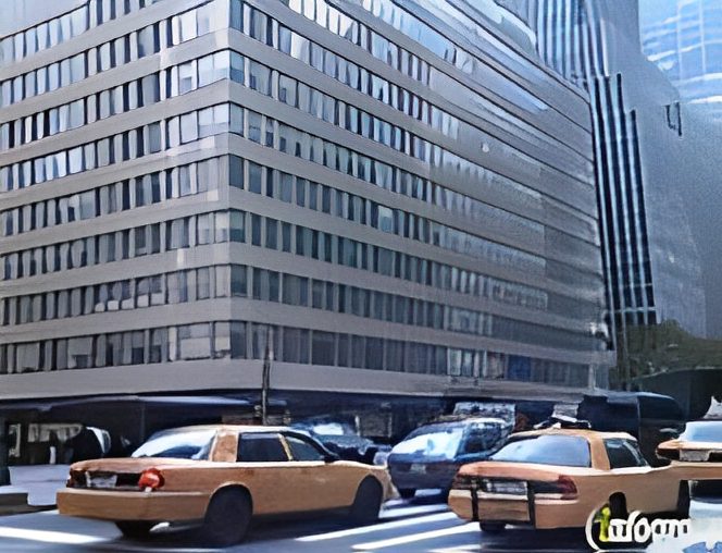 City street with taxis and buildings.