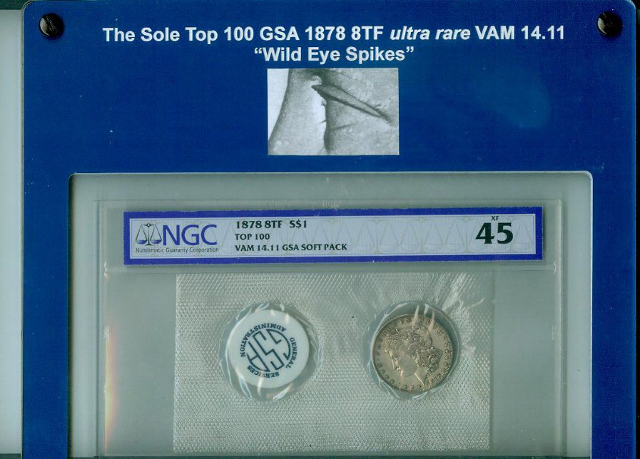 Coin display with certification and magnified detail.