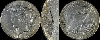 Silver coins with eagle and Liberty designs.
