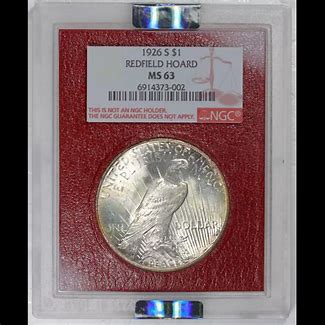 1926 silver dollar in protective case.