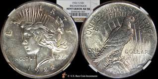 1922 Liberty and Eagle silver dollar coins.