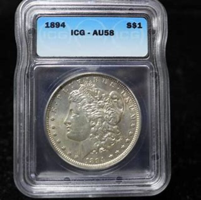 1894 silver dollar coin in protective case.