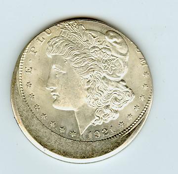 1921 silver coin with woman's profile.