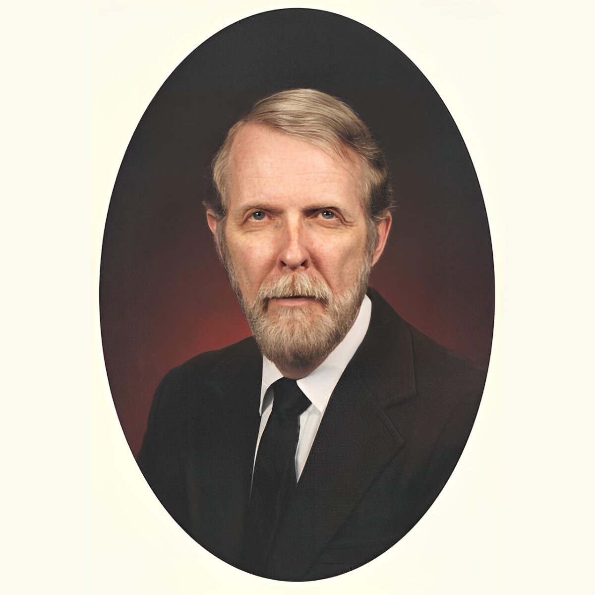 Portrait of a man in formal attire.