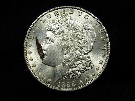 1898 silver coin with woman's profile.