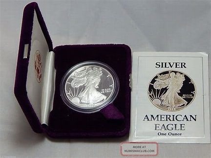 Silver American Eagle coin in display case.