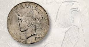 Silver coin with an eagle engraving.