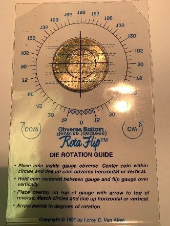 Coin rotation guide with measurement markings.
