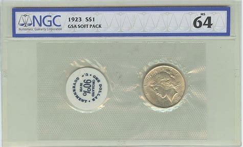 1923 silver dollar in graded packaging.