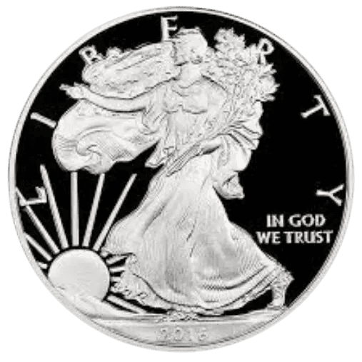 A silver coin featuring Lady Liberty with the sun rising.
