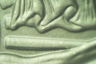 Close-up of creamy green swirl texture.
