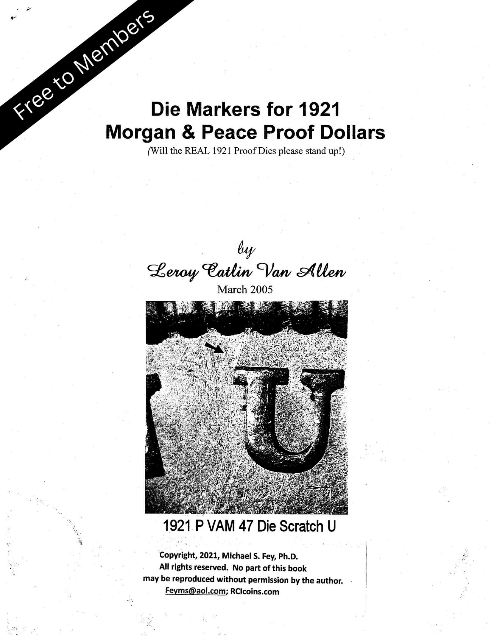 Close-up of a 1921 Morgan silver dollar's die marker showing the letter 'U'.
